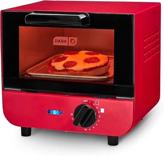 Red Dash Mini Toaster Oven with its timer control and compact cooking chamber visible.